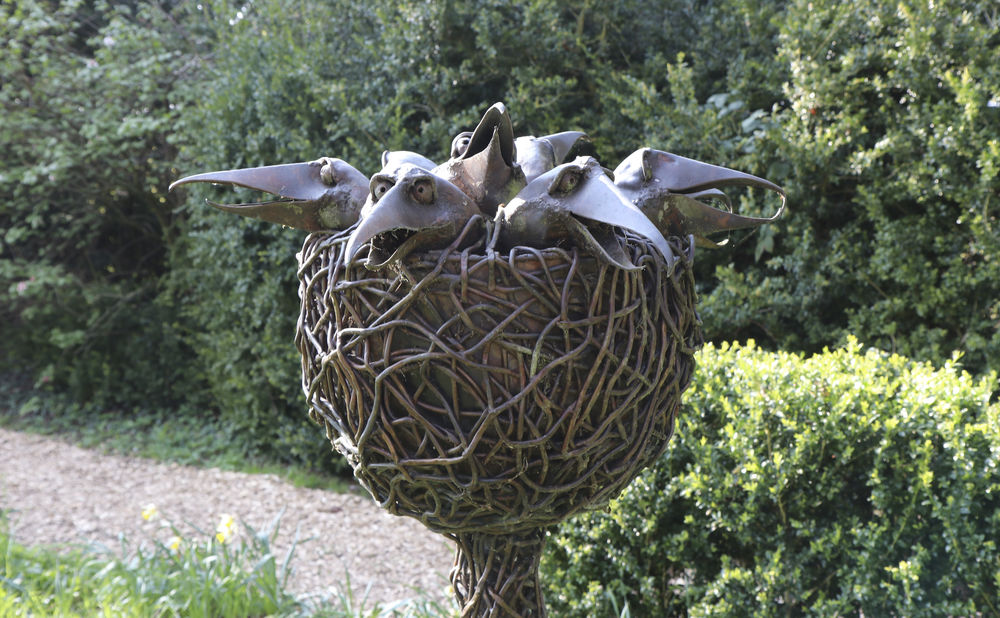 Beaky birds in a bronze nest - sculpture at Chippenham Park Gardens, March 2019
 #beakybirds #fourandtwenty #rooksorcrows #nestsculpture #funnybirds