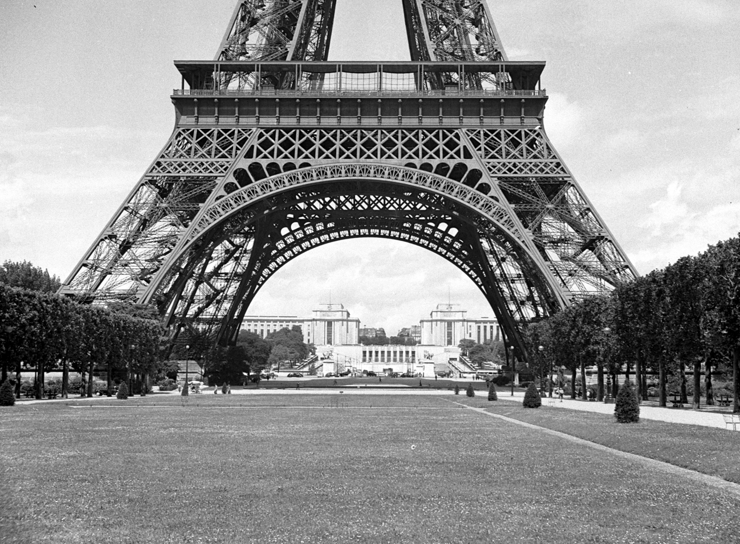 Base of the Eiffel Tower, just after the war
 #post-warfrance,eiffeltower,wartimepictures