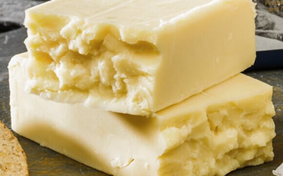 Cavern Cheddar cheese.jpg.