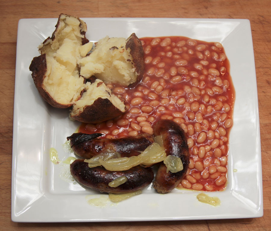 Pork honey and mustard sausages with jacket potatoes and baked beans