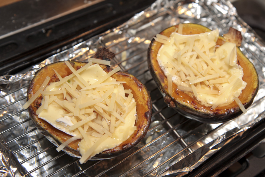 Baked squash filled with melted camembert cheese cheese loaded.jpg.