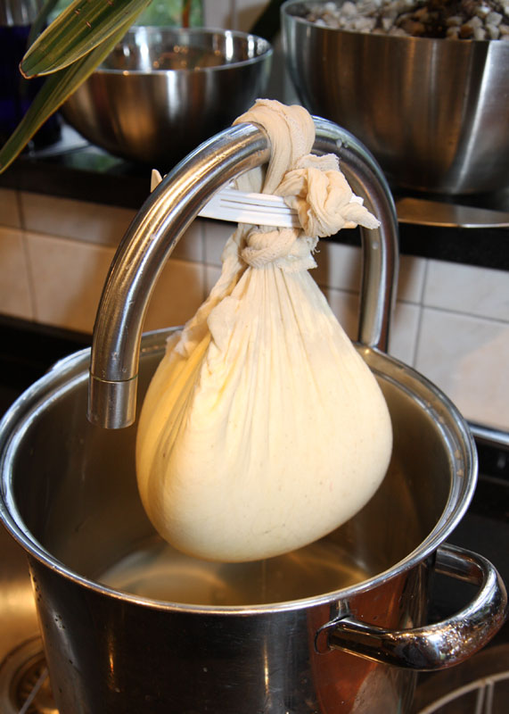 Draining the whey.jpg.