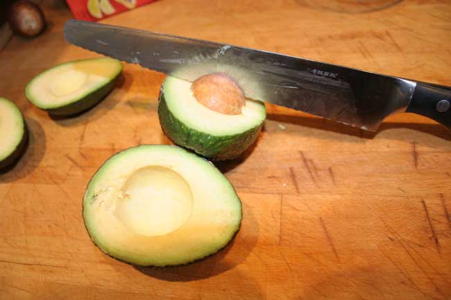 Preparing an avocado.jpg. Preparing an avocado.jpg.
