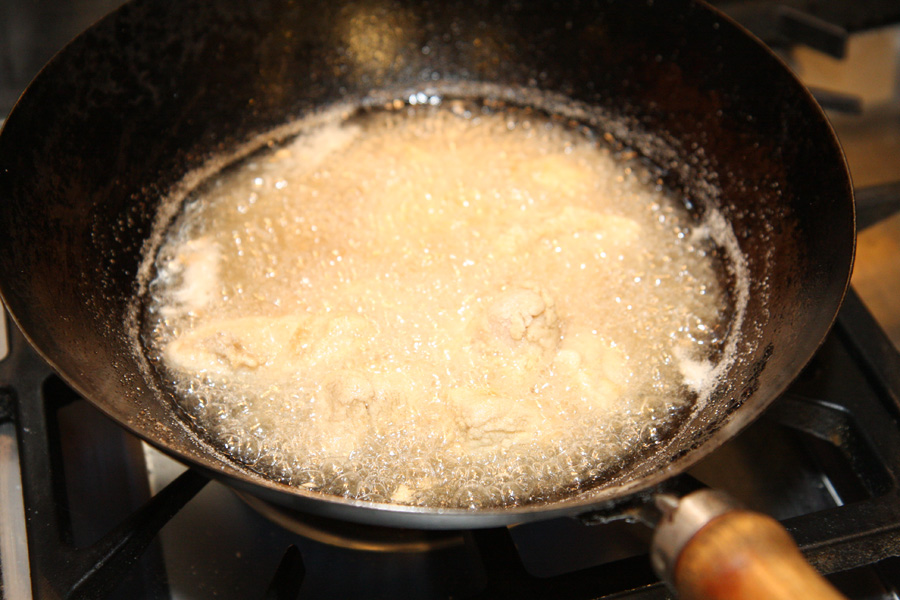 Garlic fried chicken with a masa harina crust frying.jpg. Garlic fried chicken with a masa harina crust frying.jpg.