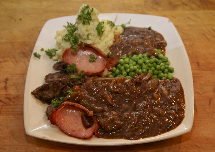 Classic liver and bacon with onion gravy a British recipe