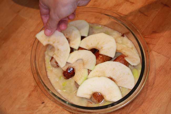 Pork sausage and apple pie layering apples.jpg.
