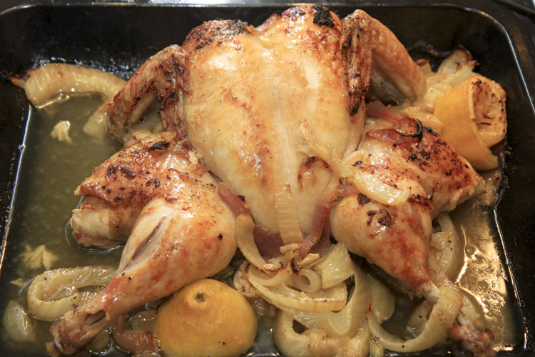 Spatchcocked chicken with fennel and onions