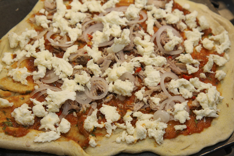 Roast pork pizza ready to bake.jpg.