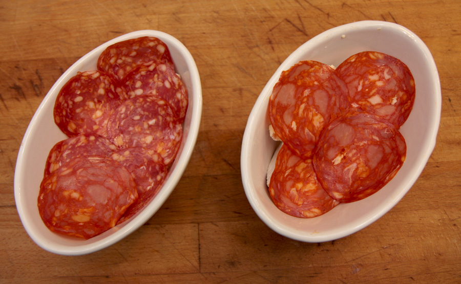 Baked Camembert with garlic, calvados and salami added.jpg. Baked Camembert with garlic, calvados and salami added.jpg.