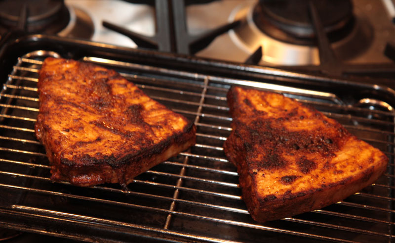 Seven spice swordfish steaks grilling.jpg.