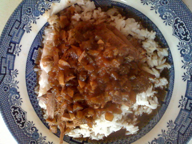 Beef, brown gravy and rice