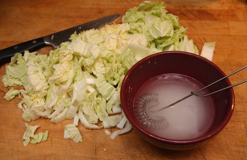 Napa cabbage and salt solution.jpg. Napa cabbage and salt solution.jpg.