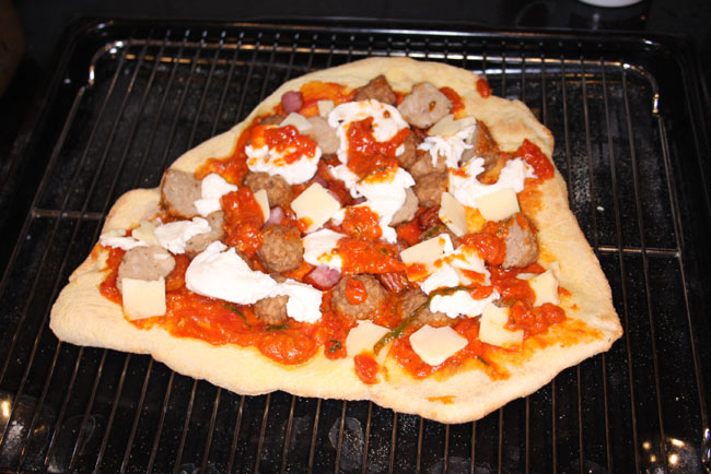 New York-style stone baked pizza ready.jpg.