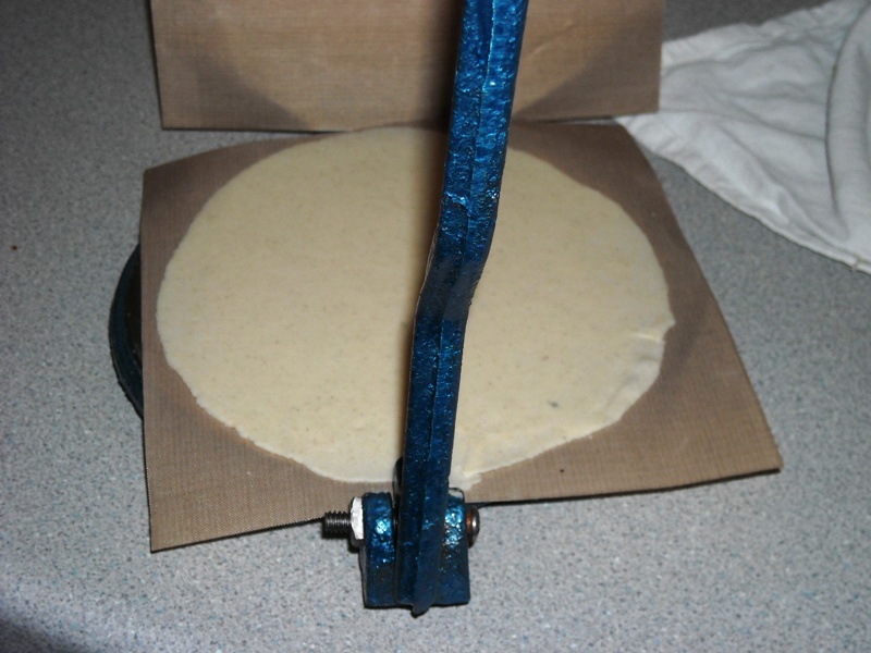 Pressing the tortillas.jpg.