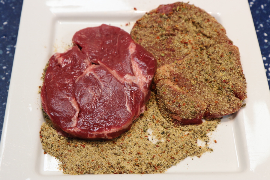 Taste Sensation Philly Cheesesteak being seasoned.jpg.