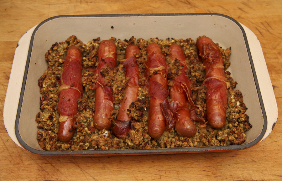 Roasted frankfurters with ham and stuffing.jpg.