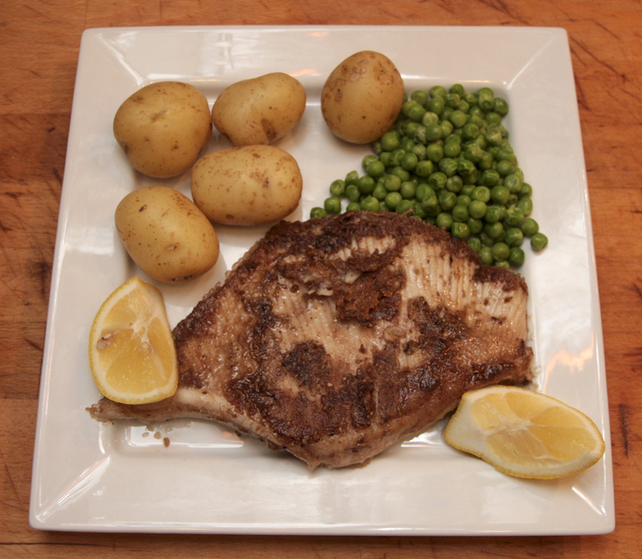 Skate wings in peppery black butter with fennel seeds