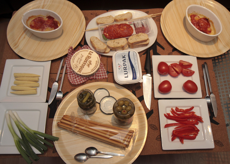 Baked Camembert with garlic, calvados and salami