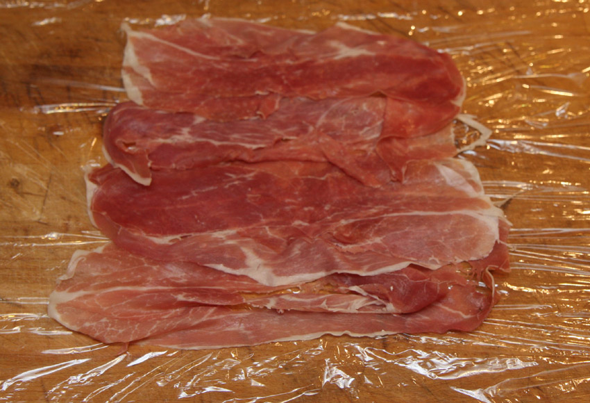 IParma ham laid on cling film.jpg.