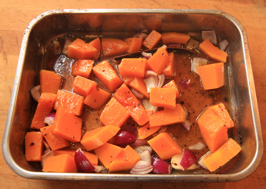 Spicy honey-glazed butternut squash ready to bake.jpg.