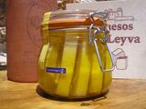 In a jar with olive oil