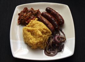 Squash mash with lentils and sausages