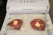 Vacuum packed fillet steaks, topped with a knob of butter