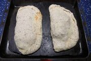 Calzone pizza, stuffed to the brim, ready to bake
