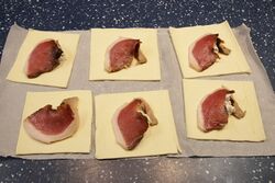 Cheese and bacon turnovers; Topped with treacly bacon