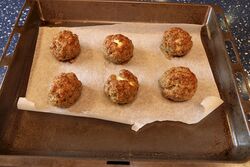 Cooked, don't worry if they split a little, they'll still taste great