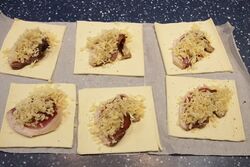 Cheese and bacon turnovers; Grated goudaand black pepper added