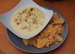 Chillies in a garlic and cheese sauce