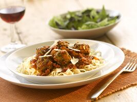 Pork and onion meat balls with sundried tomato sauce