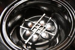 No aluminium foil? a lattice of spoons does just as well