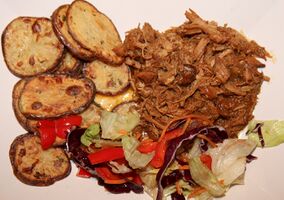 Herby sliced baked potatoes