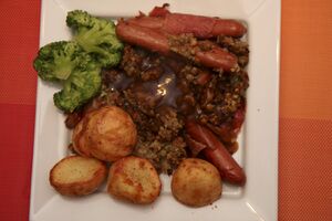 Jamon Serrano wrapped frankfurter roast, with stuffing