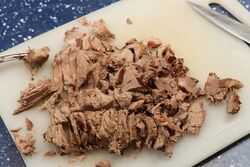 Duck breast chopped and shredded ready to serve