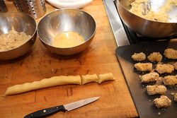 Dip in the egg-wash and roll in the breadcrumbs