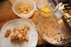 Chicken pieces coated with flour, ready to fry