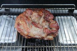 Rotate and turn the joint regularly to get an even cook