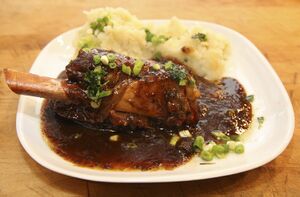 Lamb shanks in porter with dark sticky gravy