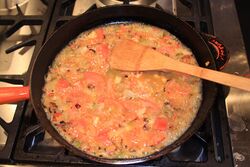 Wine and tomatoes, reducing
