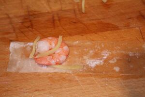 Filo pastry wrapped king prawns, brushed