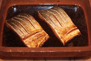 Slash the skin after descaling so marinade is absorbed both sides evenly