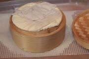 Chinese steamer used as a cheese mould