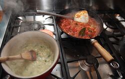 Basa in soup and garlicky tomato and pepper sauce