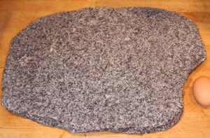 Un-trimmed granite pizza stone - £3.00 B&Q (Garden section)
